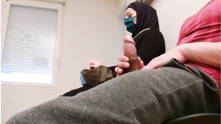 Muslim dame is providing a hj to a random, nasty guy, in front of a covert camera