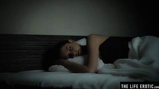 Kinky nymph is boinking her honeypot with a glass faux-cock and groaning from sensation while nutting