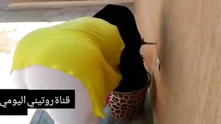 Arabic gal isn't aware that a mischievous neighbor is gazing at her monstrous donk, all day long