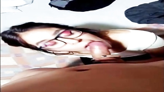 Bitchy, unexperienced honey is dressed in glasses while inhaling a rock rock hard rod like a professional