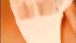 Super-Hot doll in white underpants is mildly rubbin' her vag, in front of the web camera