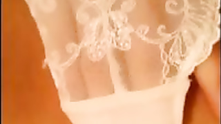Super-Hot doll in white underpants is mildly rubbin' her vag, in front of the web camera