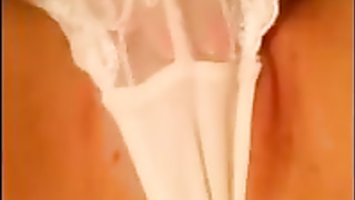 Super-Hot doll in white underpants is mildly rubbin' her vag, in front of the web camera