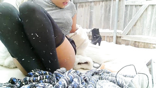 Huge-Chested female is fapping in the backyard while it's snowing and liking it a pile