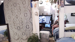 Whorey grannie with crimson hair is deep throating a faux man meat, in front of the camera