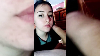 Trampy black-haired with glasses is gargling rod as deep as she can, just for joy