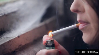 Nerdy dark haired with glasses is fingerblasting her trimmed vulva and smoking, in the middle of the night