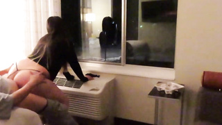 Having joy dressed in a observe thru brief sundress in motel public areas