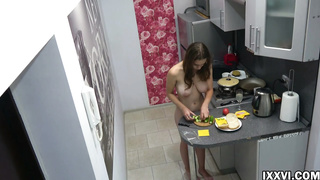 Ultra-Cute teenager brown-haired enjoys to be totally bare in the kitchen, because it perceives excellent