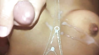 Mummy kneads her nub for nasty her step-stepson that he shoots a load on her baps with few faps