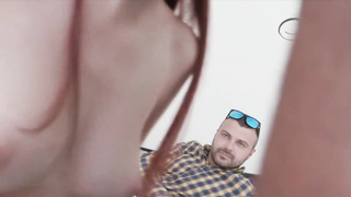 Crimson haired honey is throating beefstick at least as fine as most of her pals