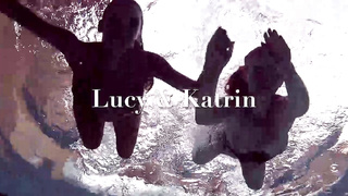 Ultra-Cute lezzies are swimming nude and rubbing each other, while no one is watchng them