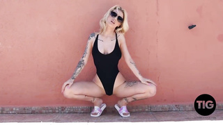 Saskia Valentine was possing in a black bathing suit when she determined to become totally bare