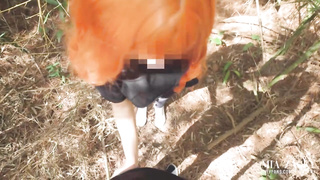 Ginger female is gargling a random fellow's man meat in a local park, before getting screwed from behind
