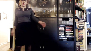 Brigitt is toying with her monstrous bosoms while penetrating a bang-out woman in front of the camera