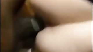 Super-Cute platinum-blonde is throating a ample, black pipe before getting it inwards her from the back