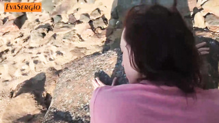 Brown-Haired in yoga trousers is deep-throating a random stranger's trouser snake on the beach, during the day