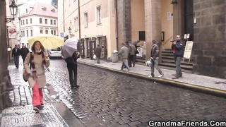 Horny grandmother is willing to have romp in front of the camera with 2 strangers