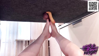 Nasty honey is fumbling her customer's beef whistle with her voluptuous soles, from under the table