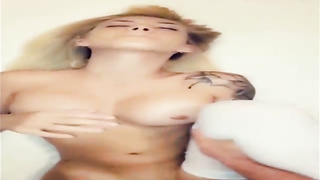 Chesty chick is wringing her milk baps while her beau is boinking her brains out