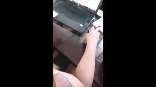 Adorable stunner is attempting to accomplish her work while her manager is masturbating off next to her
