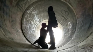 Inexperienced doll is getting on all fours on the ground and deep throating a rock rigid boner in a public place