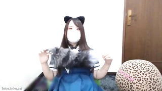 Asian brown-haired is displaying her vulva in front of the camera, just for the joy of it