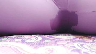 Instead of doing her spreading routine in the park, nasty chick is peeing in her stretch pants