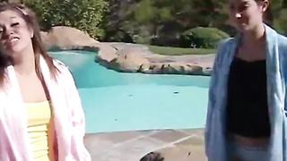 Hardly 18 lesbos are about to make love with each other next to the swimming pool