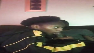 Ebony lady is throating her beau's rock rigid wood as deep as she can drink it