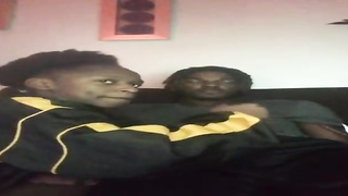 Ebony lady is throating her beau's rock rigid wood as deep as she can drink it