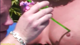 Mature dark haired is using a pile of grease while getting fisted, in the middle of the day