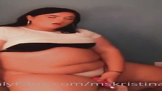 Spunky PLUMPER dark-haired, Ms Kristina is leisurely taking off her clothes in front of the camera