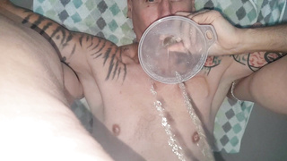 Golden piss into funnel