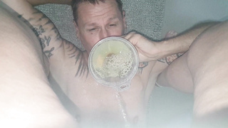 Golden piss into funnel