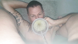 Golden piss into funnel
