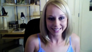 Splendid platinum-blonde is posing and taunting in front of the camera, because it senses so fine