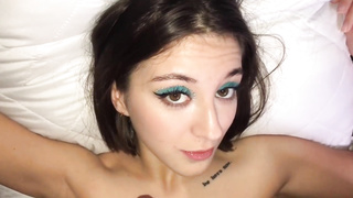 Red-Hot, nubile brown-haired is mildly fellating her paramour's rock stiff wood, in front of the camera