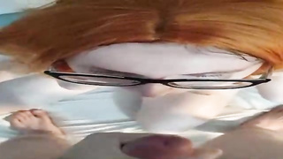 Ginger salami cocksucker is dressed in glasses while doing it and hoping to get a large facial cumshot jizz shot