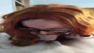 Ginger salami cocksucker is dressed in glasses while doing it and hoping to get a large facial cumshot jizz shot