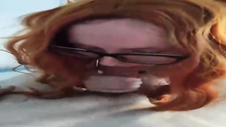 Ginger salami cocksucker is dressed in glasses while doing it and hoping to get a large facial cumshot jizz shot