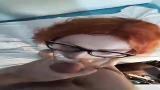Ginger salami cocksucker is dressed in glasses while doing it and hoping to get a large facial cumshot jizz shot