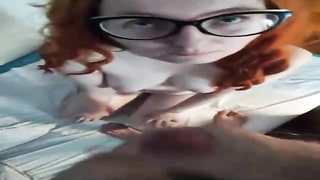 Ginger salami cocksucker is dressed in glasses while doing it and hoping to get a large facial cumshot jizz shot