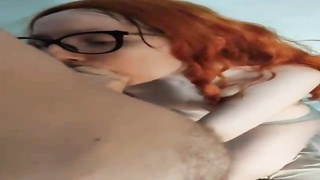 Ginger salami cocksucker is dressed in glasses while doing it and hoping to get a large facial cumshot jizz shot