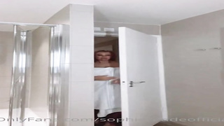 Marvelous, platinum-blonde cougar with meaty, hard hooters is having a bathroom in front of the camera