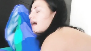 Lovable black-haired diva pokes on camera