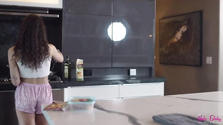 Liz Jordan is making love with a chick while they are alone in the kitchen