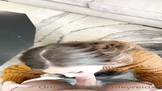 Exquisite dame, Riley Reid is getting on all fours on the floor while anxiously blowing a rock rock hard salami