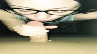 Pecker lovin’ honey is pleasuring a random dude thru a gloryhole and listening to his bellows