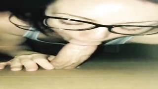 Pecker lovin’ honey is pleasuring a random dude thru a gloryhole and listening to his bellows